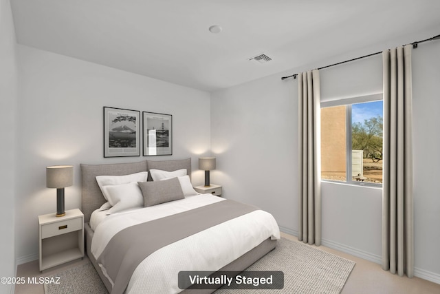 3534 E Sweet Grass Trl, Sahuarita, AZ 85629 - bedroom with baseboards and light carpet