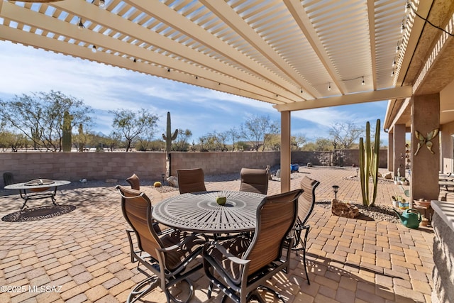3534 E Sweet Grass Trl, Sahuarita, AZ 85629 - fenced backyard with outdoor dining area, a patio, and a pergola