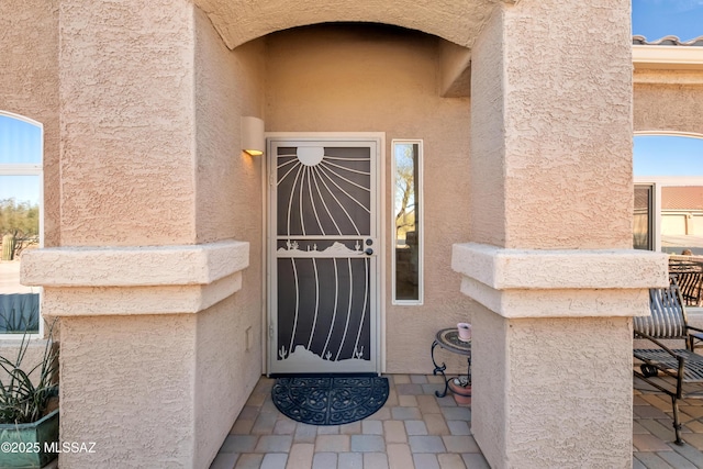 3534 E Sweet Grass Trl, Sahuarita, AZ 85629 - doorway to property with stucco siding