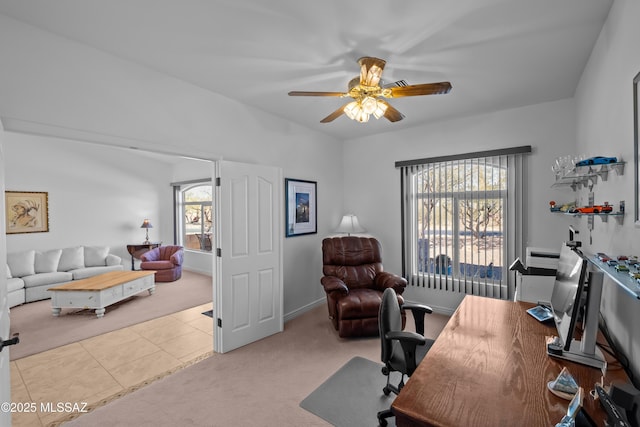 office with ceiling fan, a healthy amount of sunlight, and light tile patterned flooring