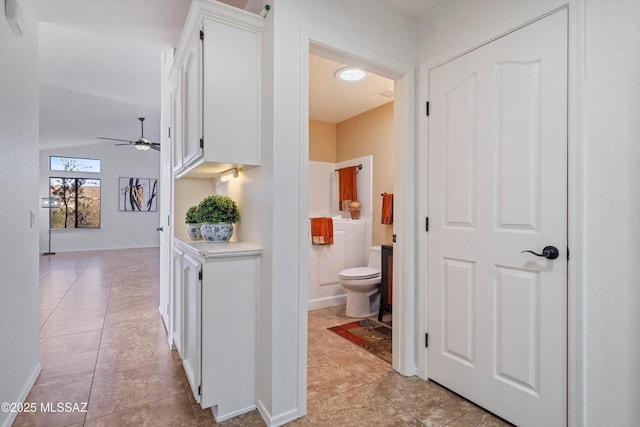 hallway with light tile patterned floors