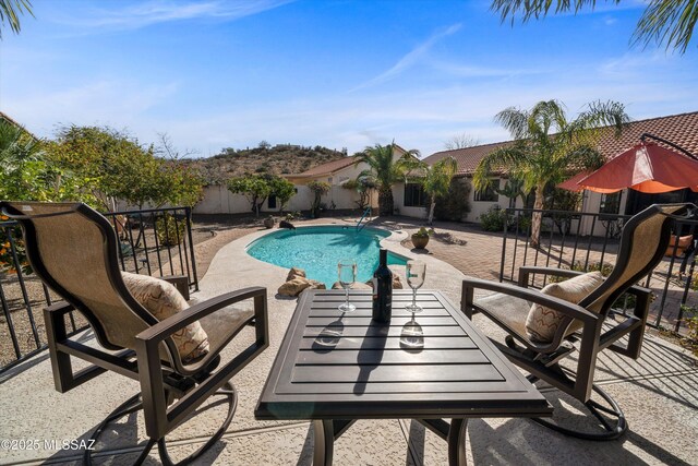 view of pool featuring a patio area