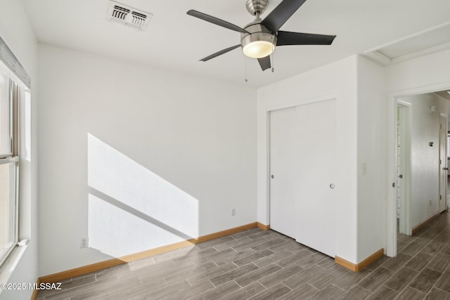 empty room featuring ceiling fan