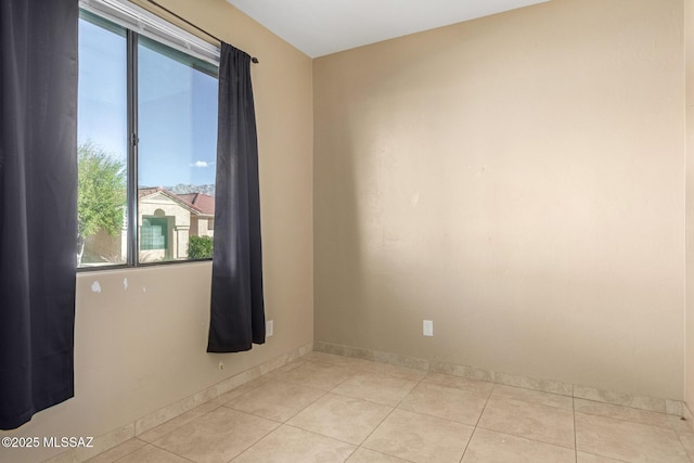 view of tiled spare room