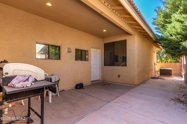 view of patio with central AC unit