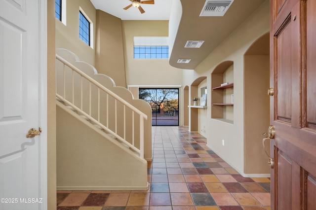 foyer with ceiling fan