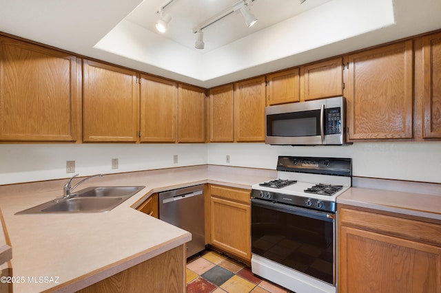 kitchen featuring stainless steel appliances and sink