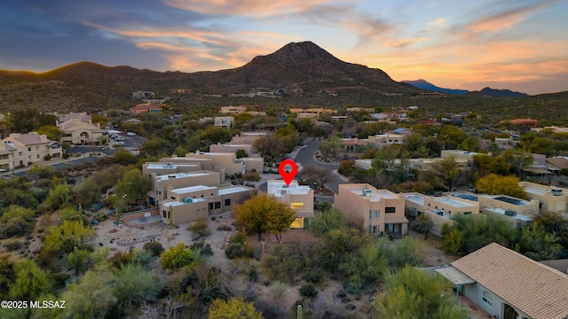 aerial view at dusk with a mountain view