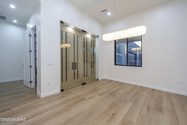 empty room featuring light hardwood / wood-style floors