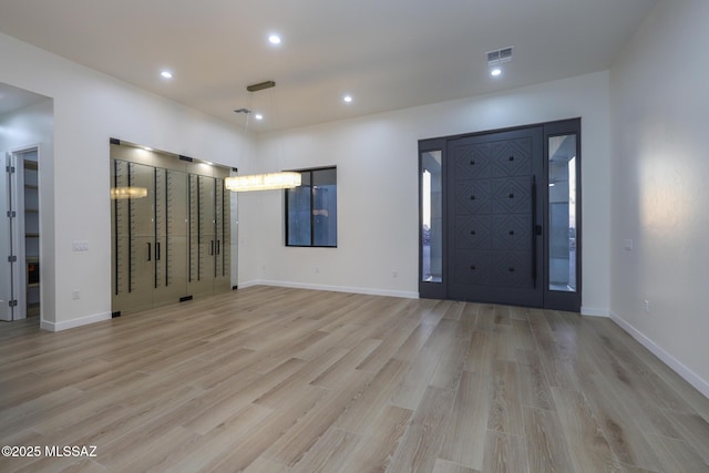 entrance foyer featuring light hardwood / wood-style flooring