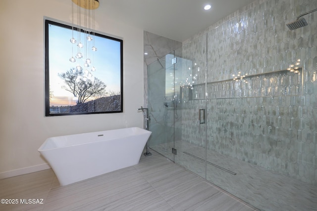 bathroom featuring plus walk in shower and tile patterned floors