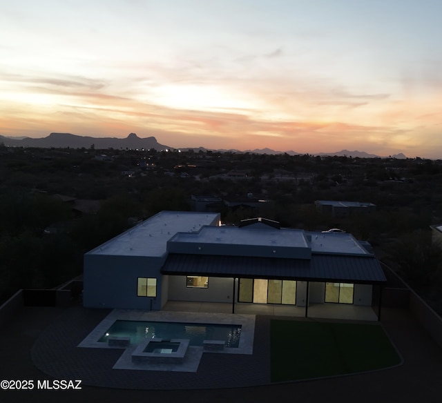 view of aerial view at dusk