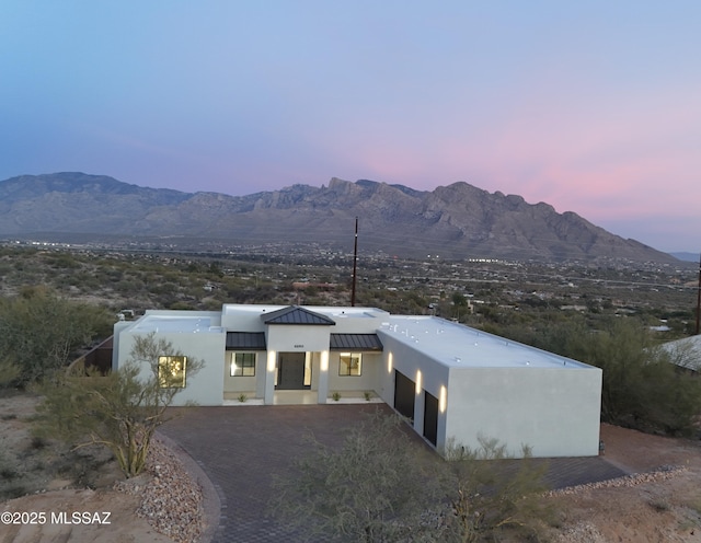 exterior space featuring a mountain view