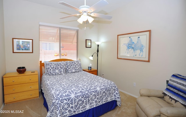 bedroom featuring baseboards, carpet floors, and ceiling fan