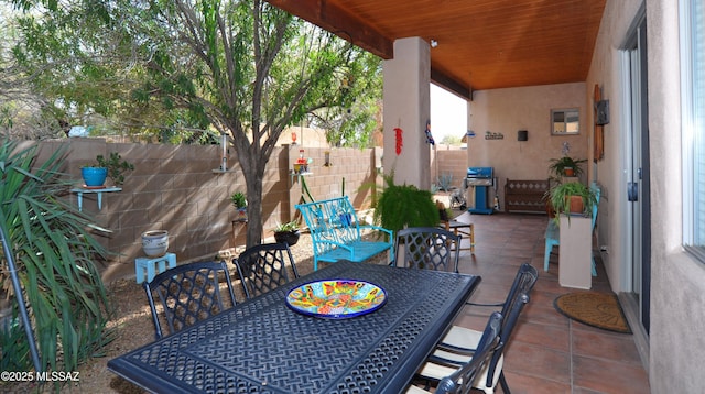 view of patio with a grill