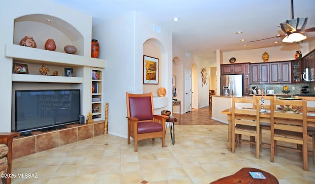 dining space with recessed lighting, built in shelves, light tile patterned flooring, and visible vents