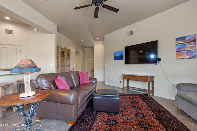living room with a ceiling fan, visible vents, and recessed lighting