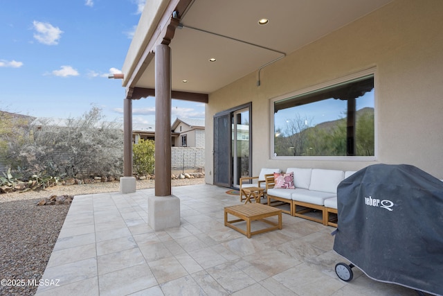 view of patio / terrace featuring fence, grilling area, and an outdoor hangout area