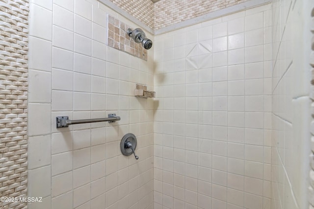 details with a tile shower