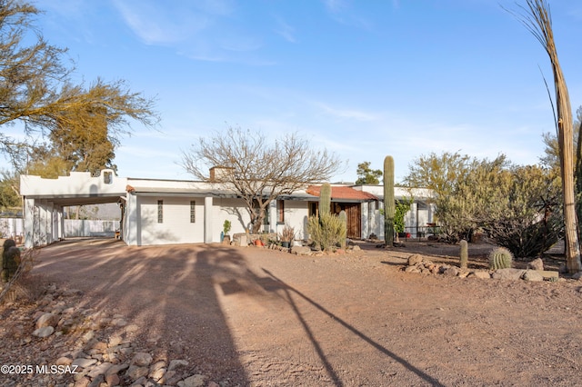 view of front facade featuring a carport