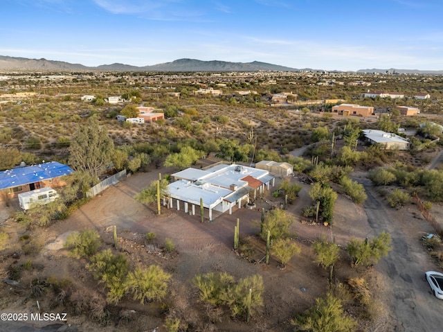 drone / aerial view featuring a mountain view