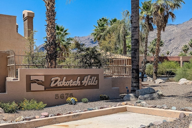 community sign featuring a mountain view