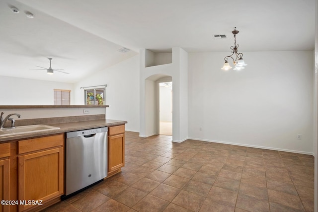 kitchen with pendant lighting, sink, dishwasher, ceiling fan with notable chandelier, and vaulted ceiling