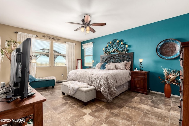 bedroom featuring ceiling fan