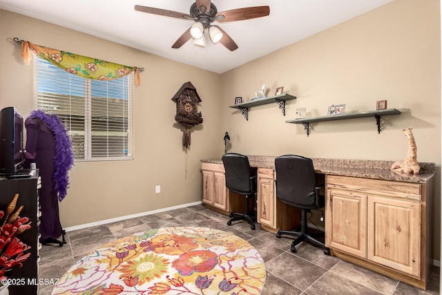 office area featuring built in desk and ceiling fan