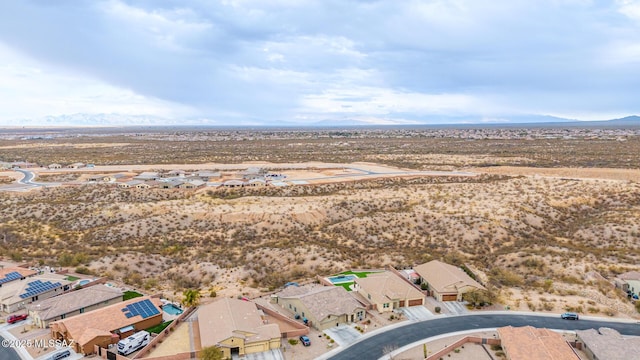 drone / aerial view featuring a mountain view