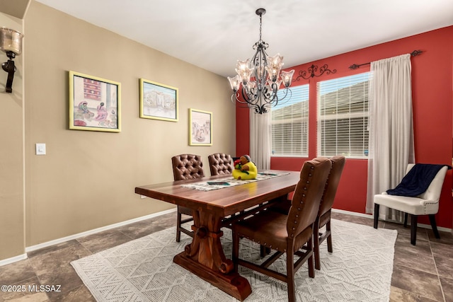 dining area with a notable chandelier