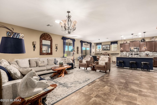 living room with a chandelier