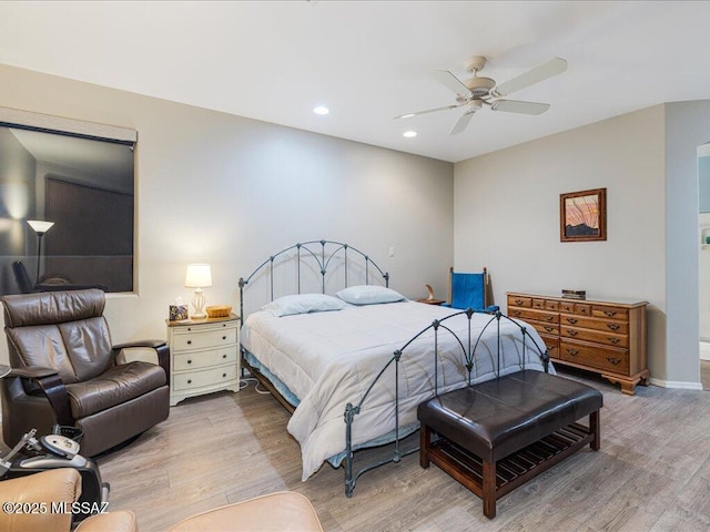 bedroom featuring ceiling fan and wood-type flooring