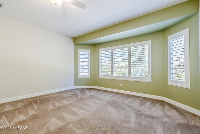 bathroom with ceiling fan, hardwood / wood-style floors, walk in shower, and vanity