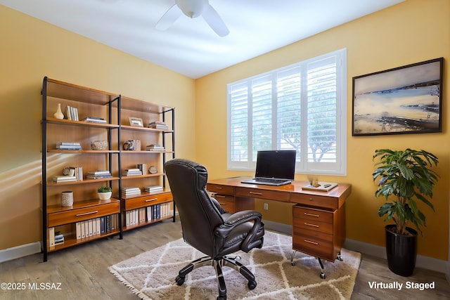 office area featuring light wood-type flooring and ceiling fan