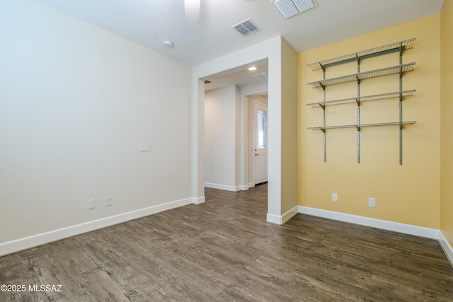 unfurnished room with hardwood / wood-style floors