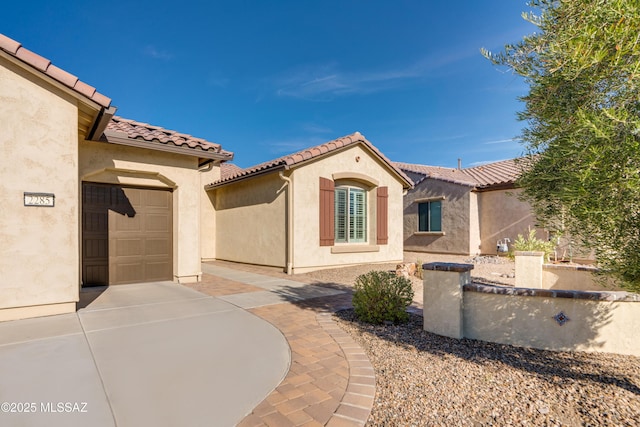 exterior space with a garage