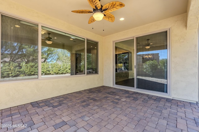 view of patio with ceiling fan