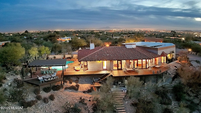 view of aerial view at dusk