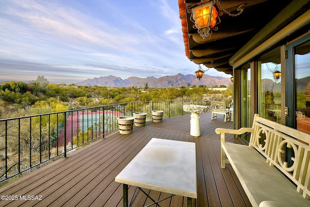 wooden terrace with a mountain view