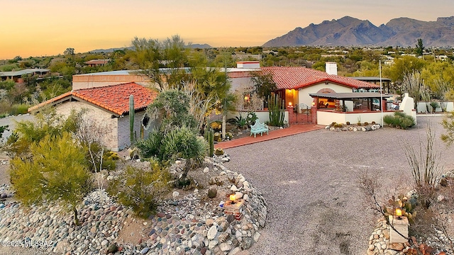 mediterranean / spanish-style house with a mountain view