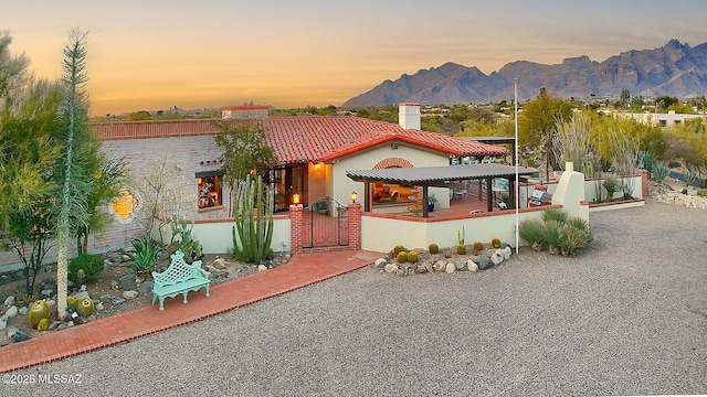 mediterranean / spanish-style home featuring a mountain view