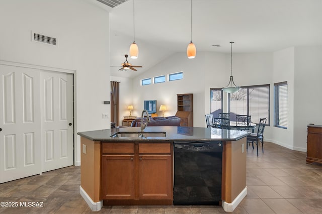 kitchen with sink, ceiling fan, high vaulted ceiling, black dishwasher, and decorative light fixtures