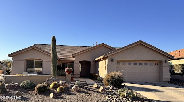 ranch-style house featuring a garage