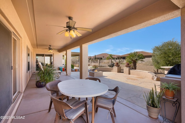 view of patio featuring ceiling fan