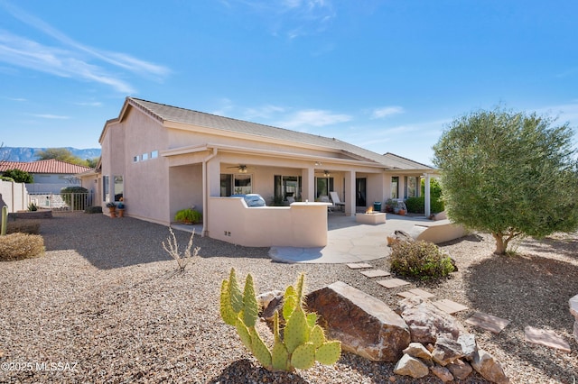 rear view of house featuring a patio area