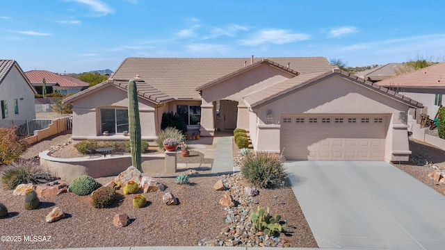 ranch-style home featuring a garage