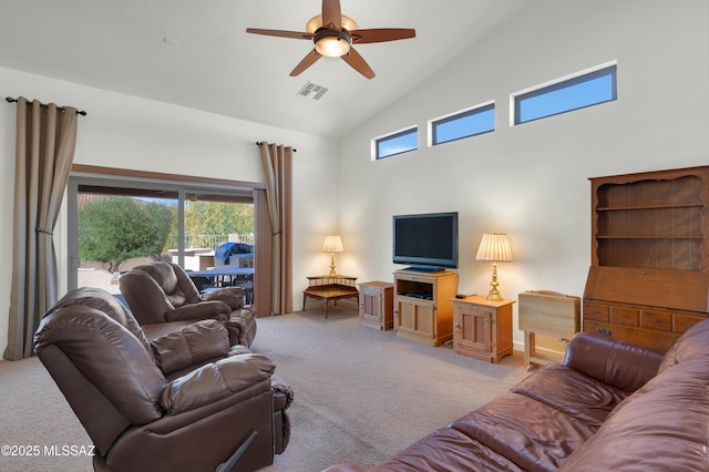 living room featuring ceiling fan, light colored carpet, and high vaulted ceiling