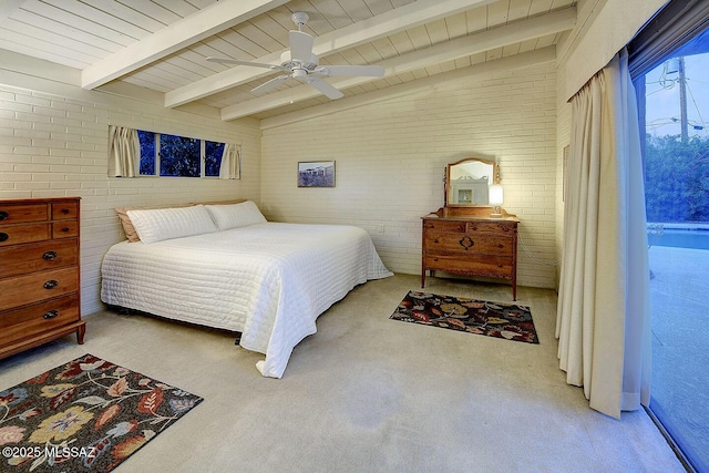 bedroom featuring carpet flooring, a ceiling fan, brick wall, and lofted ceiling with beams