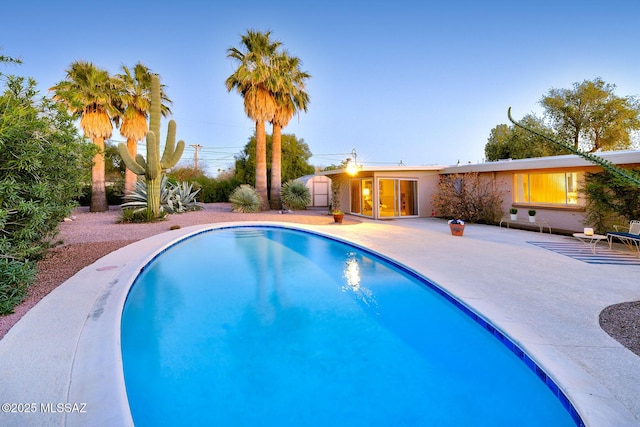 pool with a patio